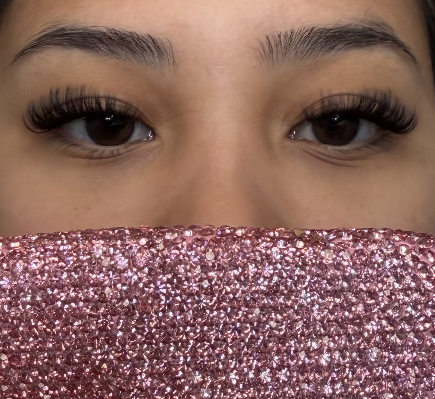 Full lash set on brown eyes with glam finish