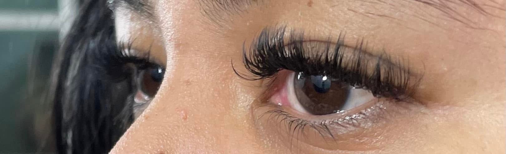 Side angle close-up of lash extensions