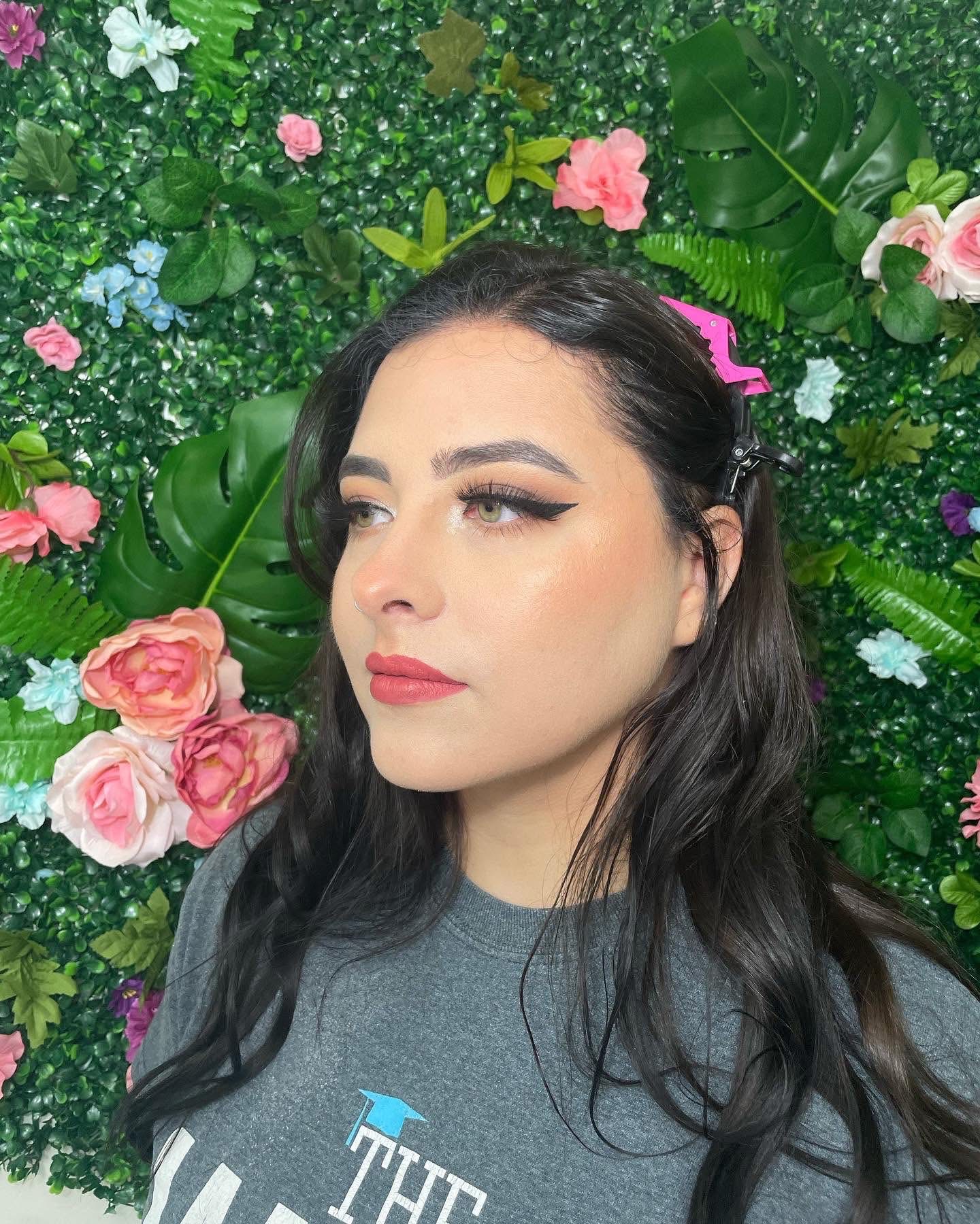 Brunette makeup look with winged eyeliner