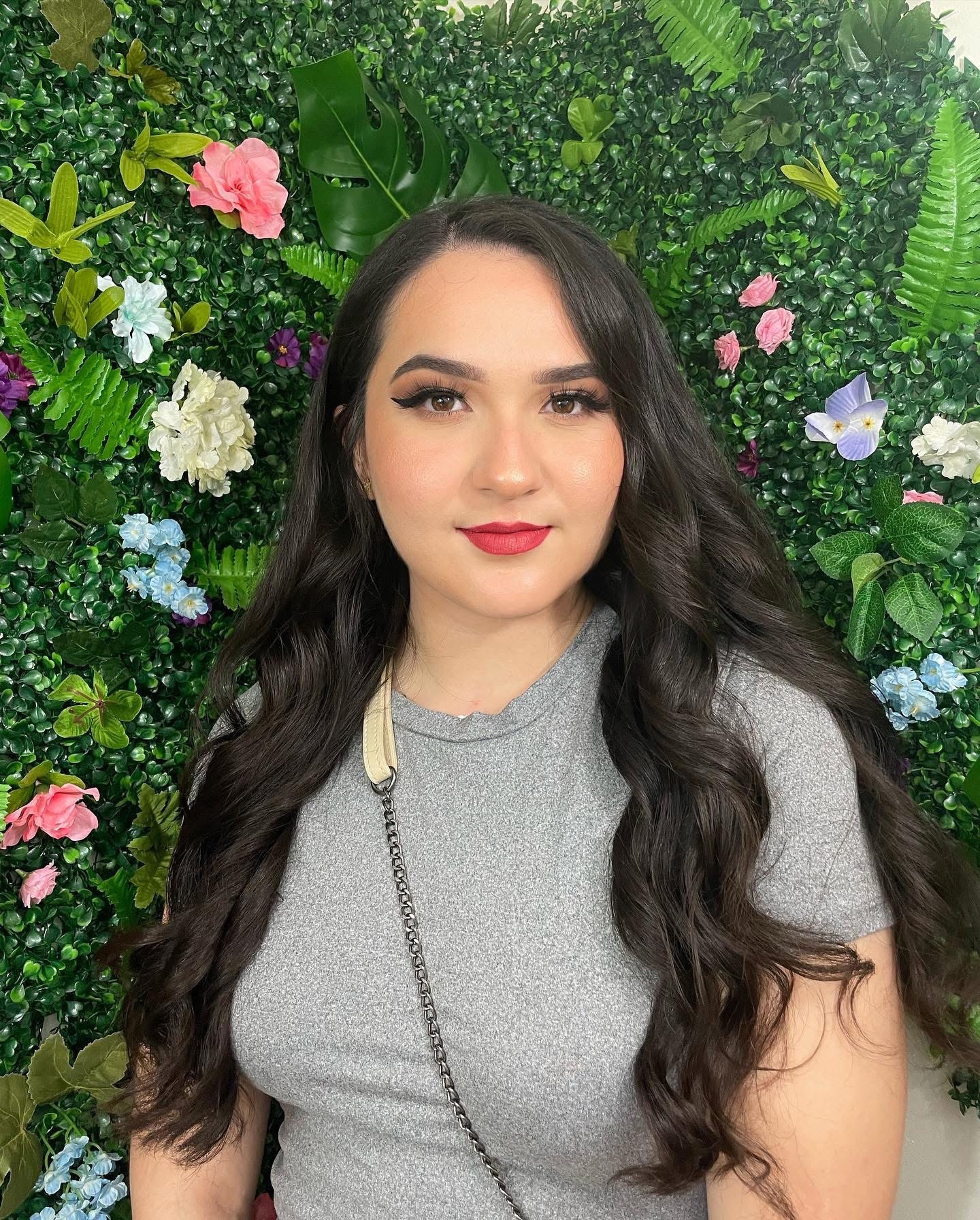 Brunette client with full glam makeup