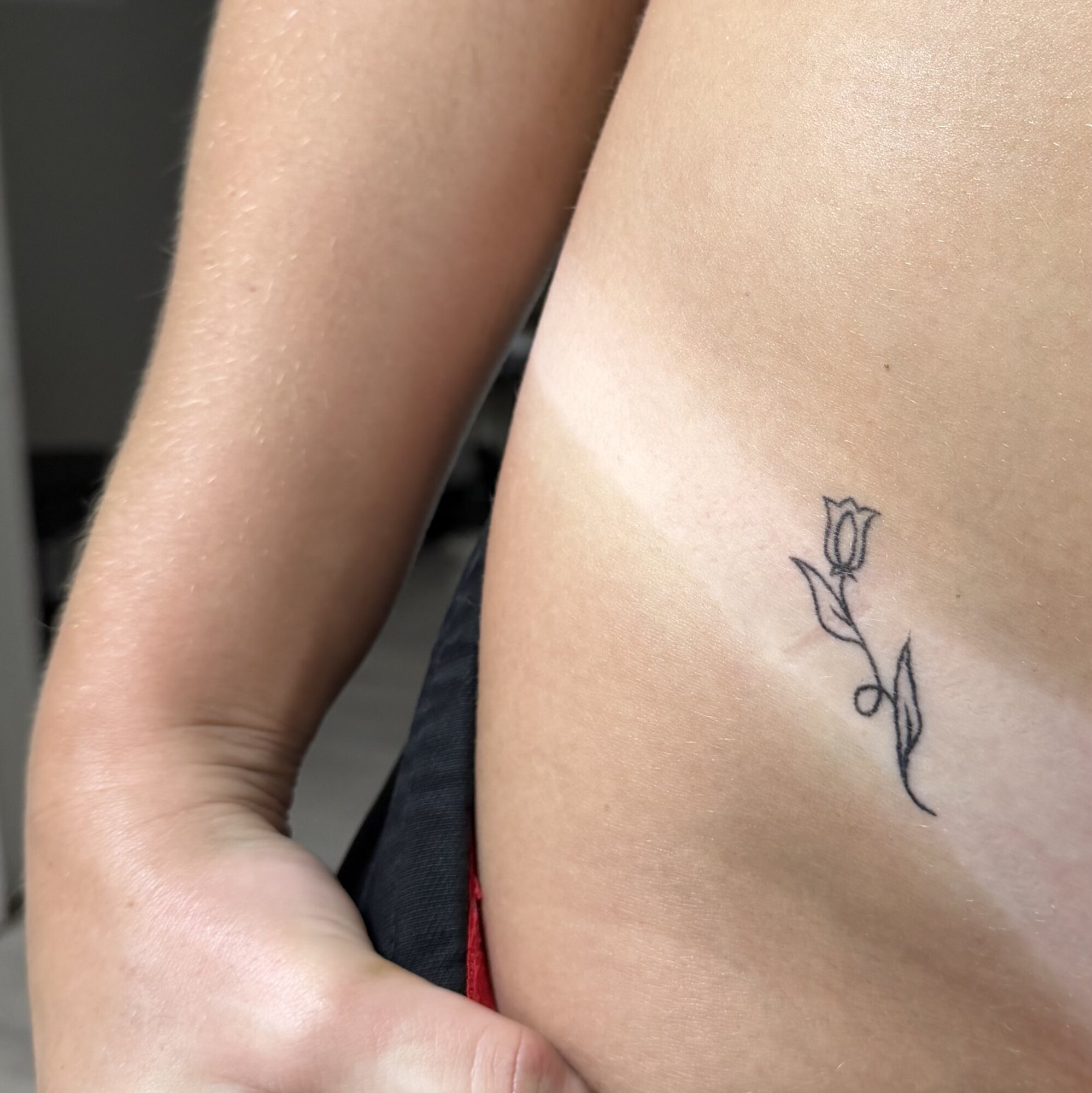 Close-up comparison of tanned skin from a spray tan service
